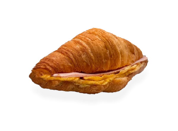 Savory French sandwich with a flaky croissant filled with layers of ham and a perfectly cooked egg. Pierre and Michel your authentic French bakery