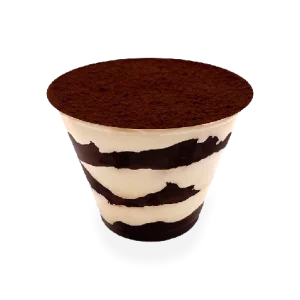 Delicious homemade tiramisu dessert served in a glass dish, consisting of layers of coffee-soaked ladyfingers, creamy mascarpone cheese, and dusted with cocoa powder. Pierre and Michel your authentic French bakery