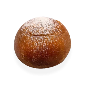 Delectable Tropezienne pastry - a golden brioche bun split in half, filled with luscious cream, and topped with a tantalizing sprinkle of powdered sugar. Pierre and Michel your authentic French bakery
