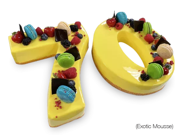 A beautifully crafted French Exotic Number Cake adorned with tropical elements, created by Pierre and Michel Authentic French Bakery in New Jersey.