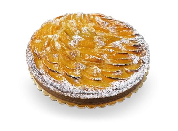 Scrumptious French tart with a buttery crust, filled with juicy peach slices, and garnished with a sprinkle of powdered sugar. Authentic French cakes by Pierre and Michel in New Jersey