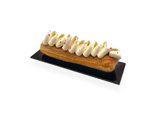 Decadent vanilla eclair with a light pastry shell, filled with creamy vanilla custard, and topped with a glossy layer of icing. Pierre and Michel your authentic French bakery