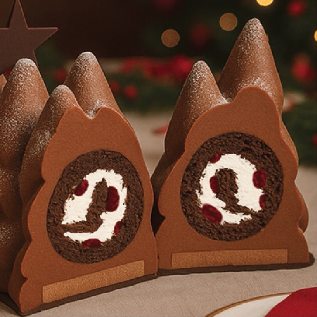 Cherry and Whipped Cream Christmas Cake (Bûche de Noël) made with dark chocolate mousse, cherry filling, chocolate sponge, and Chantilly cream, handmade fresh in New Jersey for holiday celebrations.