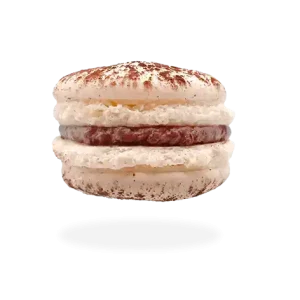 French Bailey's Irish cream macaron with a velvety filling and a dusting of cocoa powder by Pierre and Michel your authentic French bakery.
