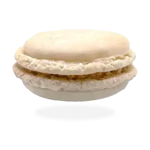 French vanilla macaron with a creamy vanilla filling, beautifully crafted with precision by Pierre and Michel your authentic French bakery.