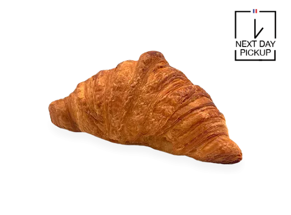 Image of a single French croissant. Authentic French cakes by Pierre and Michel in New Jersey. Pierre and Michel your authentic French bakery