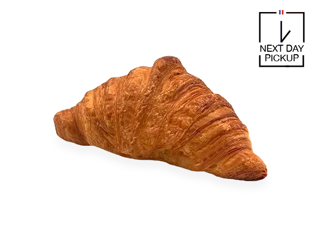 Image of a single French croissant. Authentic French cakes by Pierre and Michel in New Jersey. Pierre and Michel your authentic French bakery