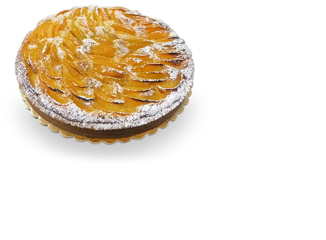 Scrumptious French tart with a buttery crust, filled with juicy peach slices, and garnished with a sprinkle of powdered sugar. Authentic French cakes by Pierre and Michel in New Jersey