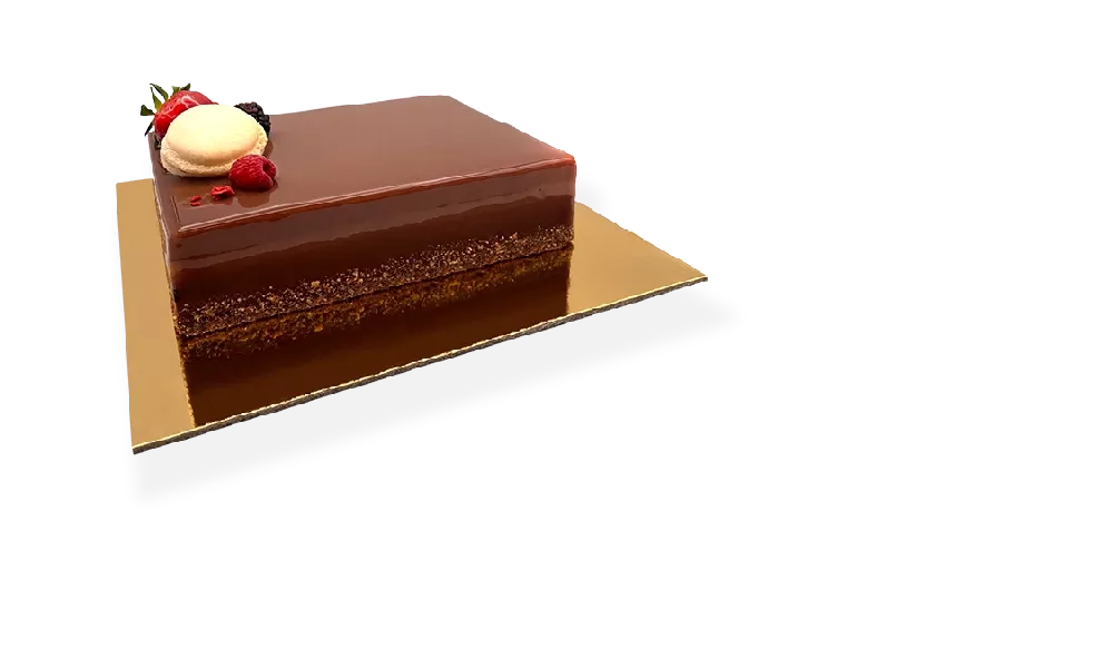 A stunning Passion Mousse Birthday Cake with layers of vibrant flavors, skillfully created by Pierre and Michel's Authentic French Bakery.
